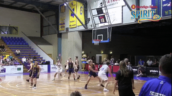 Gabrielle Richards muscles to the hoop against the Flames. "She's a really smart basketballer" Pritchard says.