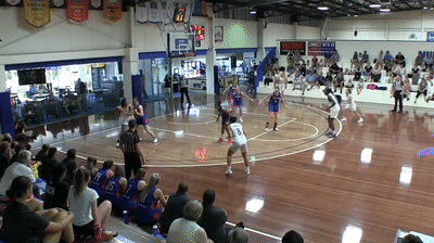Future Capitals guard Maddi Rocci gets to the hoop, draws contact and finishes.
